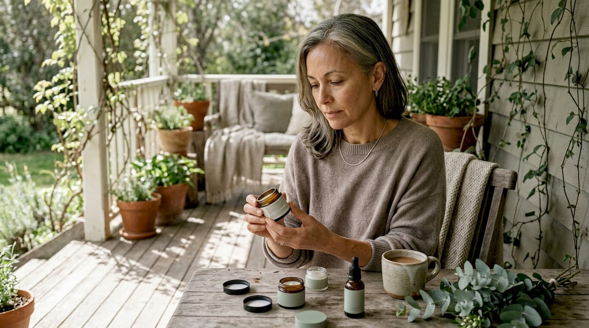 Woman reading skincare product labels at home