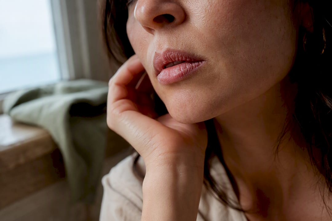 Editorial close-up of dry cracked lips