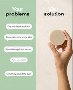 A hand holds a round beige skincare bar on the right side, next to a split graphic. The left side is light green with text reading 'Your problems' listing dry/dehydrated skin, rosacea/eczema-prone skin, weak/damaged skin barrier, acne-prone skin, and sensitivity around the eyes.