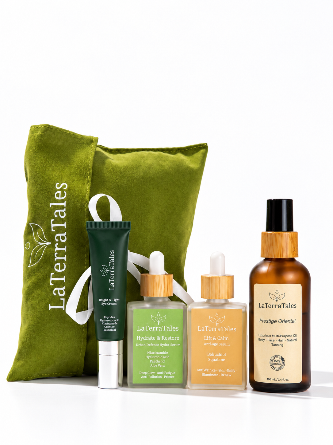 LaTerraTales self-care gift set featuring a green velvet pouch, a dark green tube, a green bottle, an amber bottle, and a clear bottle with a bamboo cap, arranged on a white background.