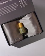 Silk pillowcase and bottle with 'ceesilks' branding in a box on a light background