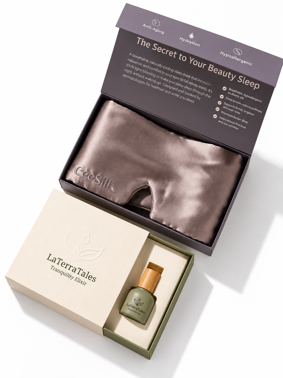 LaTerraTales Tranquility Elixir beauty gift set featuring a silky taupe sleep mask in an open dark gray box, alongside a small bottle of Tranquility Elixir in a cream-colored box.